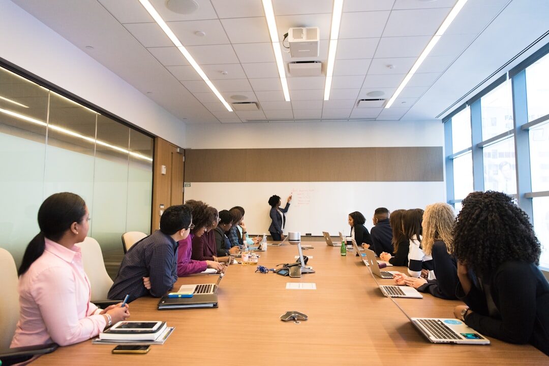 Conference room with people watching a presentation
